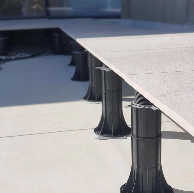 Cuántos soportes regulables por m2 de terraza ventilada en baldosas